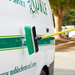 Carlisle 3646875 Flo Thru 10" Green Flagged Vehicle And Wall Cleaning Brush